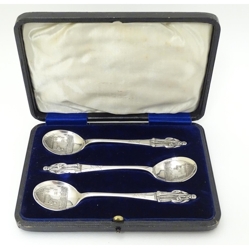 235 - An unusual set of 3 silver apostle spoons the bowls decorated with scenes within a shield cartouche ... 