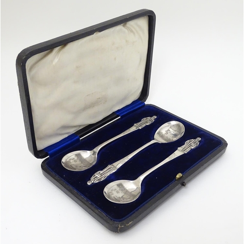 235 - An unusual set of 3 silver apostle spoons the bowls decorated with scenes within a shield cartouche ... 