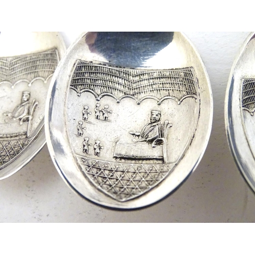 235 - An unusual set of 3 silver apostle spoons the bowls decorated with scenes within a shield cartouche ... 