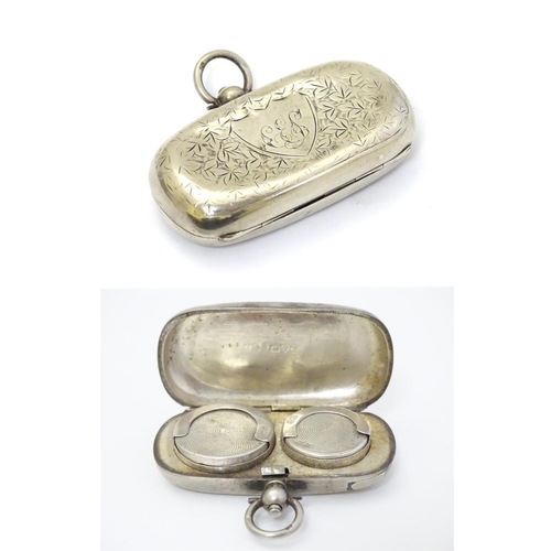 240 - A silver sovereign case / carrier of oblong form opening to reveal provision for sovereign and half ... 