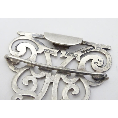 245 - A silver nurses buckle hallmarked Birmingham 1901 maker Adie Lovekin Ltd. 3 1/4'' wide overall