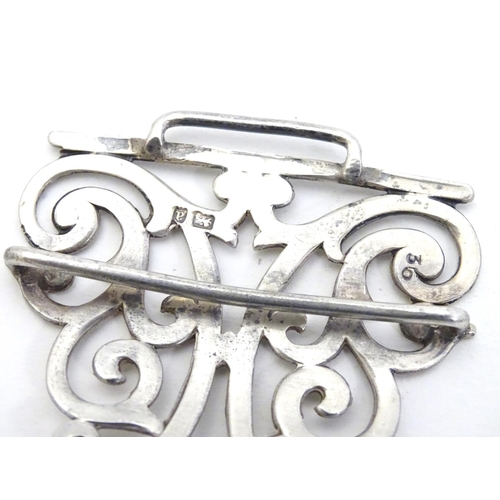 245 - A silver nurses buckle hallmarked Birmingham 1901 maker Adie Lovekin Ltd. 3 1/4'' wide overall