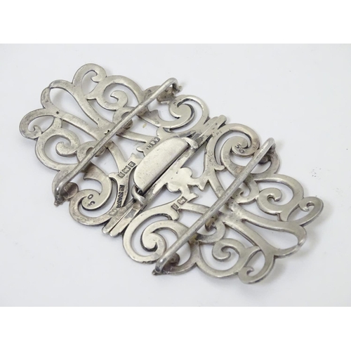 245 - A silver nurses buckle hallmarked Birmingham 1901 maker Adie Lovekin Ltd. 3 1/4'' wide overall