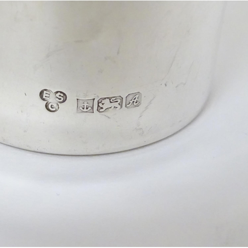 246 - A silver tot cup hallmarked Birmingham 1975 maker ESC  1 3/4'' high (22g)