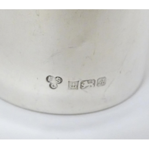 246 - A silver tot cup hallmarked Birmingham 1975 maker ESC  1 3/4'' high (22g)