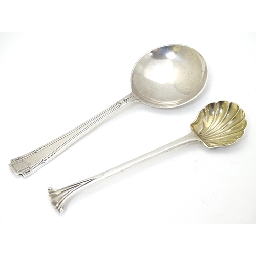 257 - A silver Albany pattern salt spoon with shell formed bowl hallmarked London 1871 maker Henry Holland... 