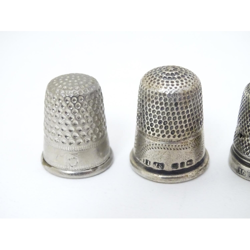 260 - 5 assorted thimbles including 2 hallmarked silver examples and a  .830 silver thimble with hammered ... 