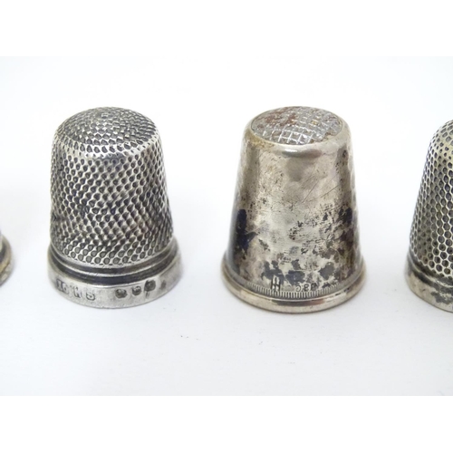 260 - 5 assorted thimbles including 2 hallmarked silver examples and a  .830 silver thimble with hammered ... 