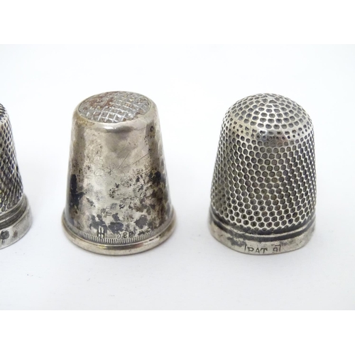 260 - 5 assorted thimbles including 2 hallmarked silver examples and a  .830 silver thimble with hammered ... 