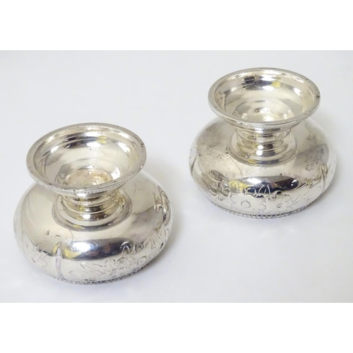 261 - A silver plate pepperette together with a pair of salts.