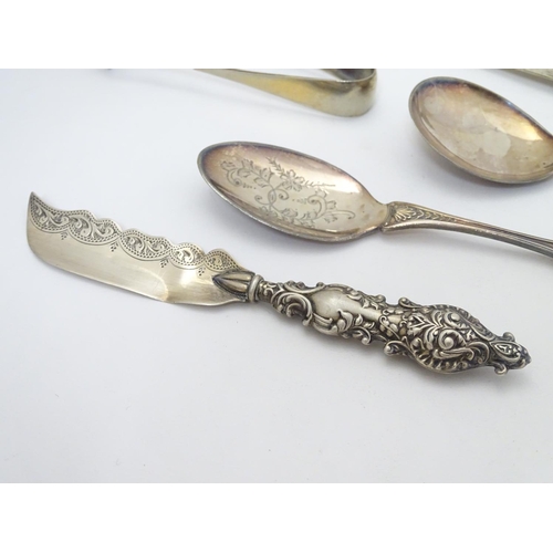 268 - A pair of silver teaspoons hallmarked Sheffield 1930 maker William Gallimore & Sons, a silver butter... 