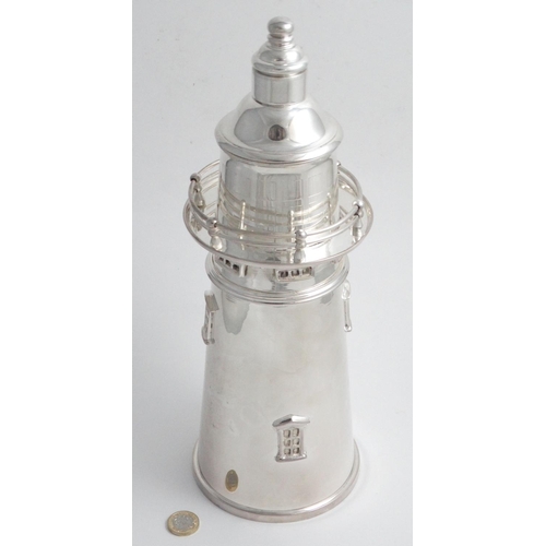 269 - A novelty silver plate cocktail shaker formed as a lighthouse. 21stC  14'' high