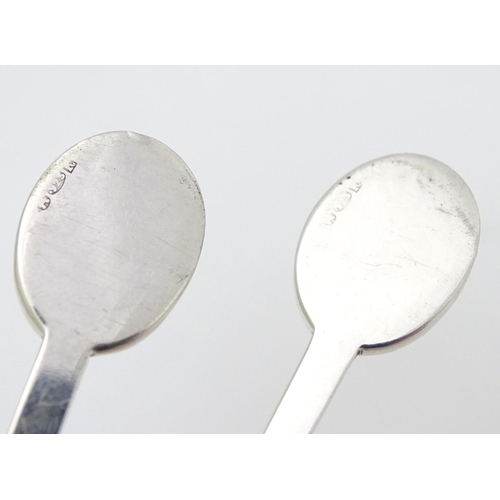 270 - A pair of silver teaspoons marked RNLI to handles and with crossed golf club detail. Hallmarked Shef... 