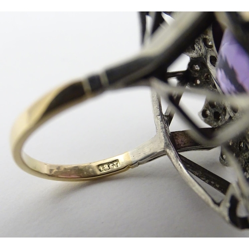 279 - An impressive 18ct gold cocktail ring set with large central oval amethyst approx 6.50ct bordered by... 