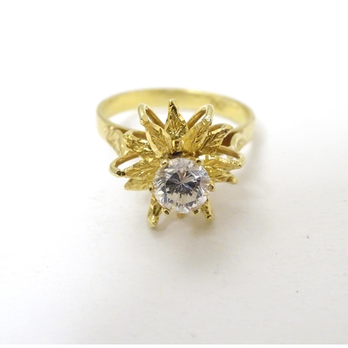 282 - A vintage 18ct gold cocktail ring set with central diamond approx 0.50ct