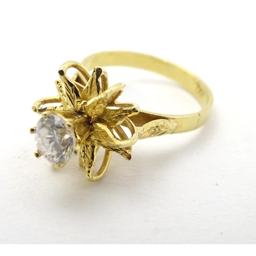 282 - A vintage 18ct gold cocktail ring set with central diamond approx 0.50ct