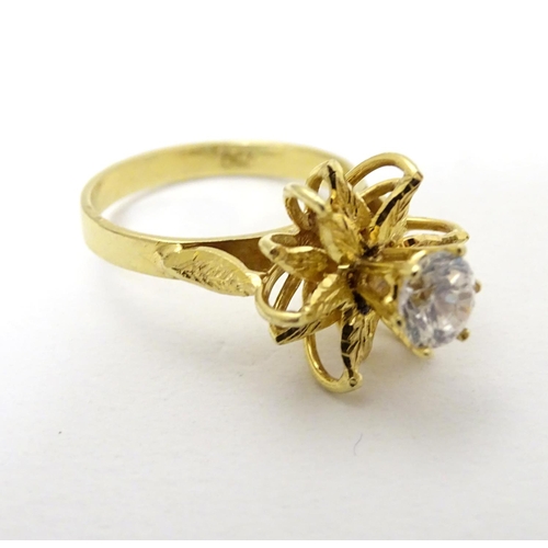 282 - A vintage 18ct gold cocktail ring set with central diamond approx 0.50ct