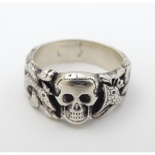 293 - A silver ring with skull and serpent decoration, in the manner of a totenkopf ring. Marked Muller.