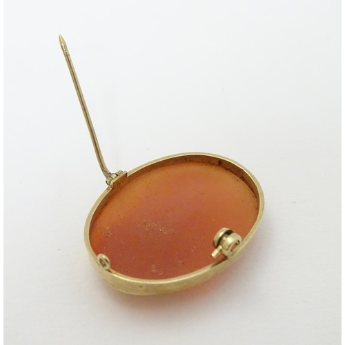 295 - A Cameo brooch depicting a lady in side profile, within a 9ct gold mount. 1 ¼''