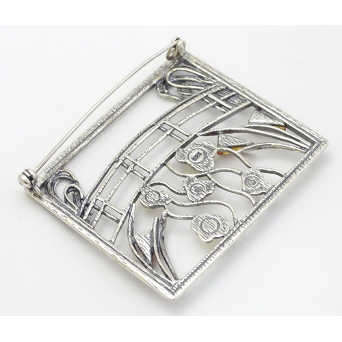 300 - A silver brooch inspired by the work of Claude Monet set with amber detail. 2'' wide. The box marked... 