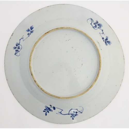 31 - A 19thC Chinese blue and white dish, decorated with auspicious artifacts such as scrolls, vases and ... 