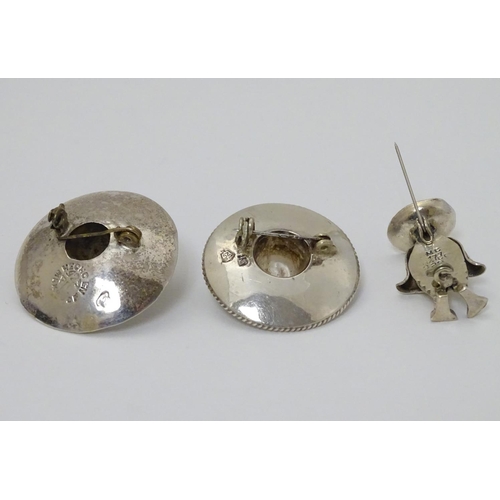 319 - 3 various mid-late 20thC Mexican silver brooches comprising 2 formed as sombreros one set with turqu... 