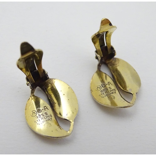 328 - Scandinavian Jewellery: A pair of Norwegian silver gilt earrings of leaf form with yellow enamel dec... 