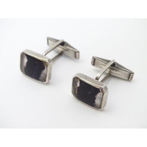 329 - A pair of Sterling Silver cufflink set with Blue John.