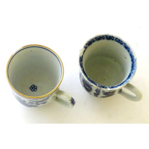 33 - Two Chinese blue and white teacups, one decorated with flowers and foliage, the other with figures. ... 