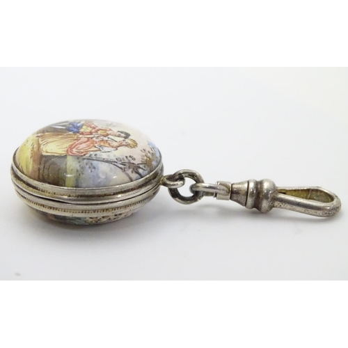 335 - A 19thC double sided locket with enamel decoration depicting figures in a landscape approx 7/8'' dia... 