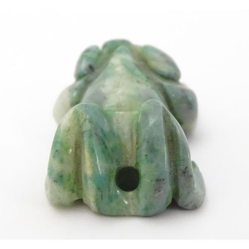 338 - A carved green pendant formed as a frog 1 1/4''