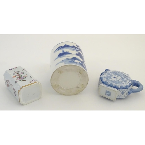 34 - Three assorted Chinese ceramics comprising a blue underglaze brush pot with a mountainous landscape,... 