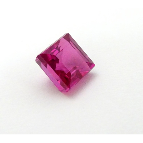 349 - Unmounted stone: A pink square cut sapphire,approx 9.95 ct, approx 3/8'' wide