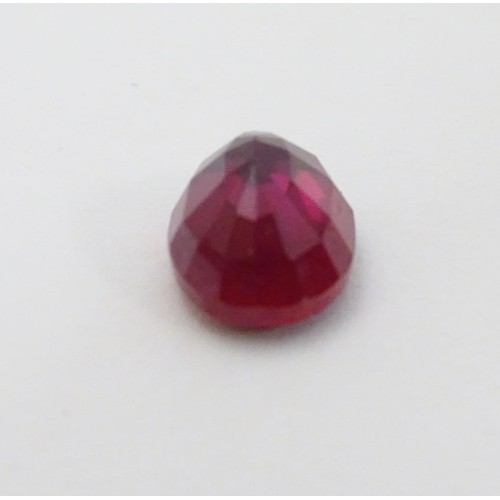 351 - Unmounted stone: A red oval cut Ruby. approx 8.20 ct, approx ½'' long