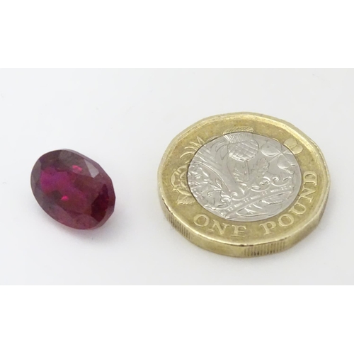 351 - Unmounted stone: A red oval cut Ruby. approx 8.20 ct, approx ½'' long