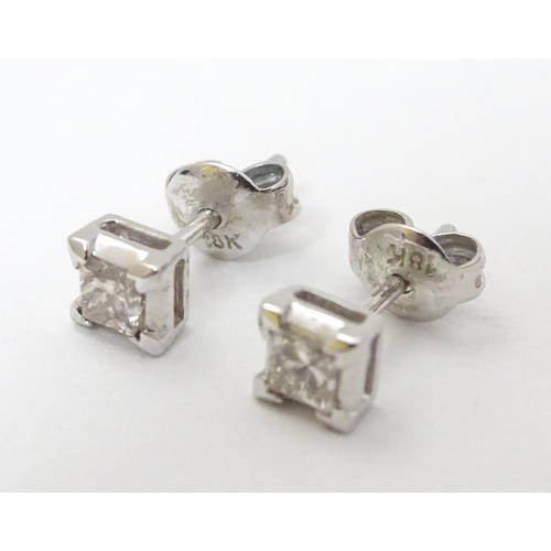 359 - A pair 18ct white gold diamond solitaire earrings. Each diamond 0.50ct