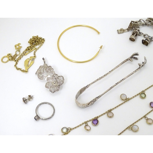 370 - Assorted jewellery including silver bracelet, brooch etc together with silver sugar tongs etc