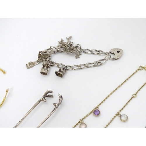 370 - Assorted jewellery including silver bracelet, brooch etc together with silver sugar tongs etc