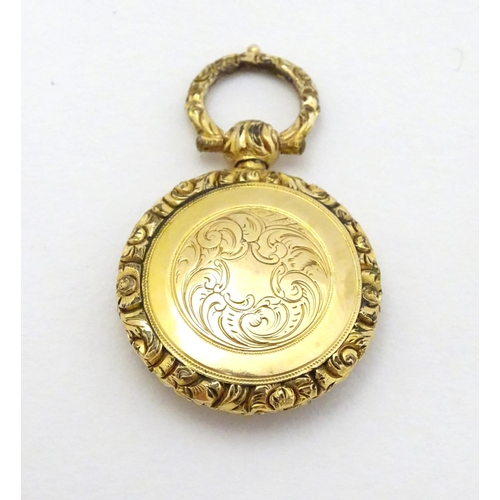 381 - A 19thC pinchbeck locket pendant, approx 7/8'' diameter