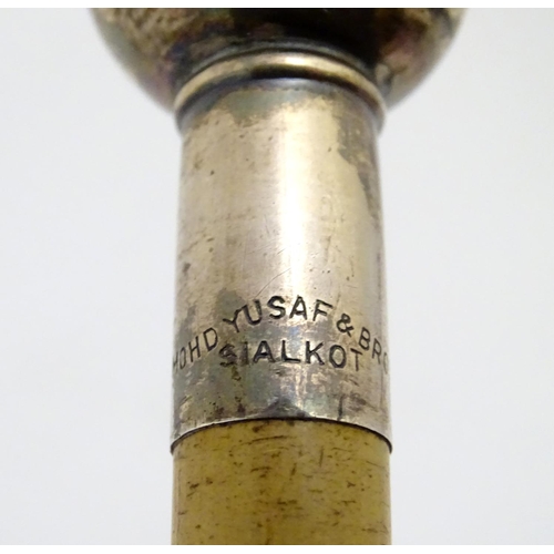 400 - Militaria: an early to mid 20thC Officer's swagger stick, of light malacca with silvered knop, beari... 