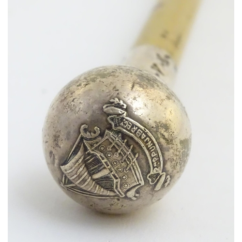 400 - Militaria: an early to mid 20thC Officer's swagger stick, of light malacca with silvered knop, beari... 