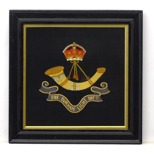 414 - Militaria : An early 20thC framed embroidered banner of the Durham Light Infantry , the insignia nee... 