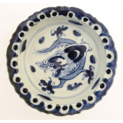 42 - A quantity of Chinese items to include a bowl with a hand painted fish design, approx. 9'' diameter;... 