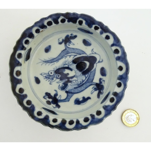 42 - A quantity of Chinese items to include a bowl with a hand painted fish design, approx. 9'' diameter;... 