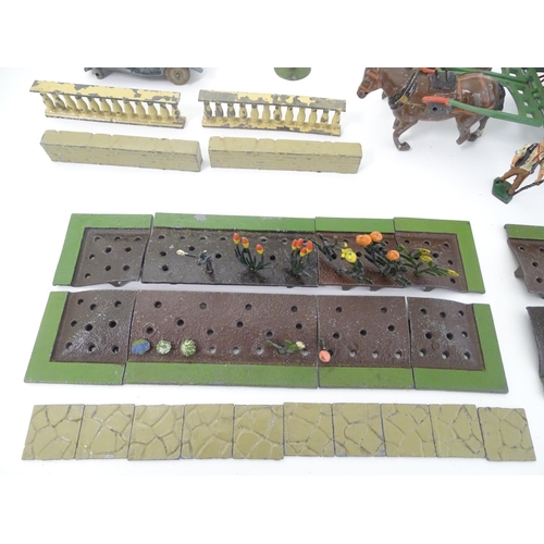 429 - Diecast lead figures: Britains Ltd, London, a garden polychrome set to include a plethora of plants:... 