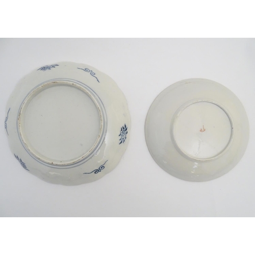 43 - A quantity of Japanese items to include two hand painted plates, one with a scalloped edge and panel... 