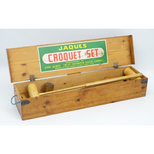 433 - Croquet: Jaques boxed set having 4 signed mallets & 6 hoop mallets, 4 primary coloured balls, centre... 