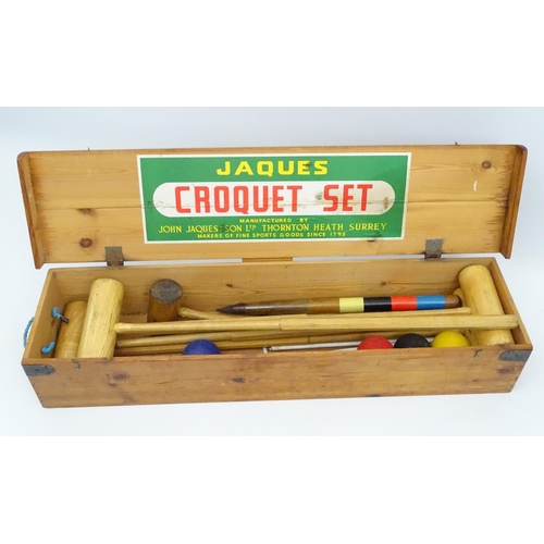 433 - Croquet: Jaques boxed set having 4 signed mallets & 6 hoop mallets, 4 primary coloured balls, centre... 