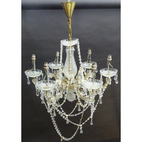 440 - Chandelier: a glass 6 branch pendant electrolier with brass fitments, 22'' wide x 16'' high.