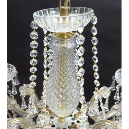 440 - Chandelier: a glass 6 branch pendant electrolier with brass fitments, 22'' wide x 16'' high.